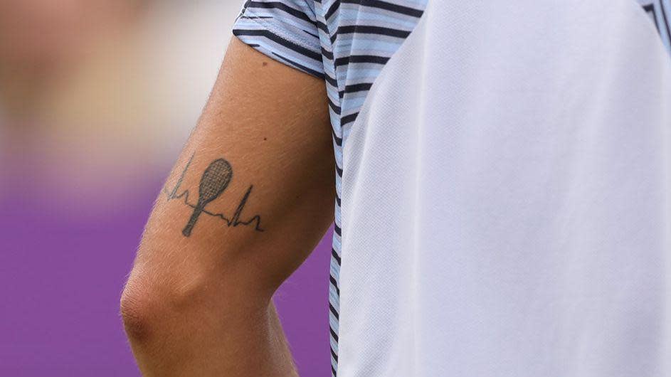 A tattoo on the arm of Lorenzo Musetti of Italy