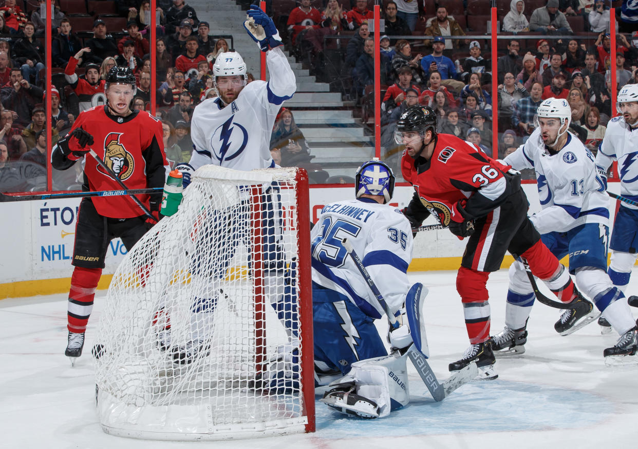 OTTAWA, ON - JANUARY 4:  Colin White #36 of the Ottawa Senators head-buts the puck into the back of the net against Curtis McElhinney #35 and Victor Hedman #77 of the Tampa Bay Lightning at Canadian Tire Centre on January 4, 2020 in Ottawa, Ontario, Canada.  (Photo by Andre Ringuette/NHLI via Getty Images)