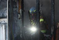 <p>Firefighters put out a fire at a burning hospital in Miryang, South Korea, Jan.26, 2018. (Photo: Kim Dong-min/Yonhap via Reuters) </p>