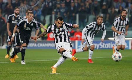 Juventus v Real Madrid - UEFA Champions League Semi Final First Leg - Juventus Stadium, Turin, Italy - 5/5/15 Juventus' Carlos Tevez scores their second goal from the penalty spot Reuters / Sergio Perez