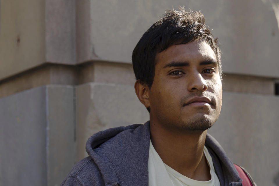 Cleiver Rodriguez, 24, poses for a portrait, Thursday, Sept. 15, 2022, in New York. Rodriguez, an immigrant from Venezuela, arrived to Manhattan in a bus sent by Texas governor Greg Abbott and is thankful for a free ride to New York. (AP Photo/Julia Nikhinson)