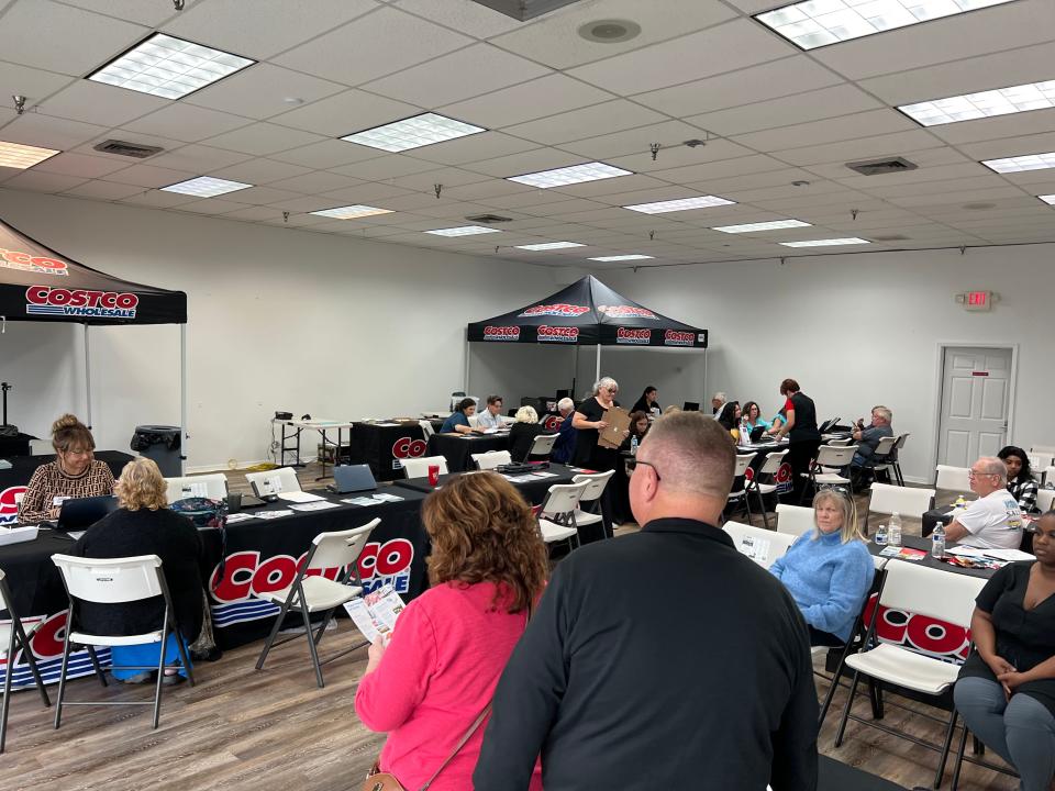 People line up to purchase memberships to Costco at the chain's temporary membership sales/hiring office at the Shoppes at One Daytona on Thursday, Jan. 18, 2024. The membership warehouse club chain is set to open a Costco store and Costco gas station at One Daytona, across from Daytona International Speedway, on Feb. 22.