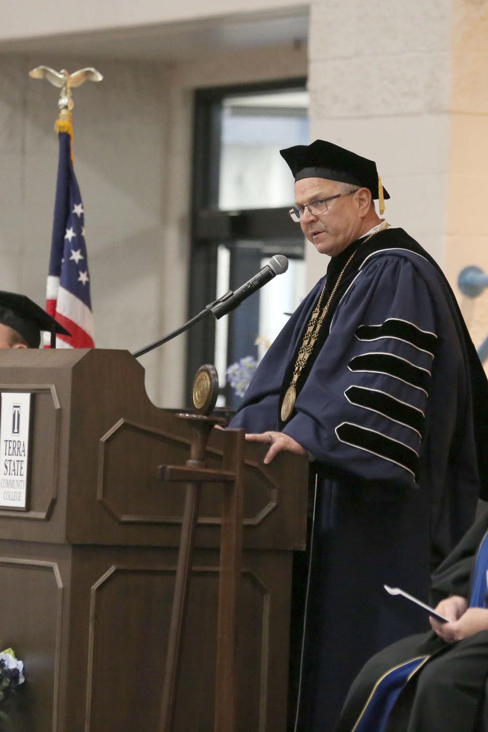 Dr. Ronald M. Schumacher, President of Terra State Community College, addresses the crowd at the 2024 graduation ceremony.