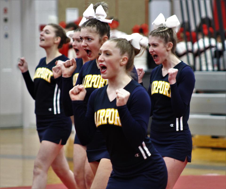 Airport's competitive cheerleading team competes during Round 1 of the Huron League championship at Grosse Ile on Tuesday, February 8, 2022.