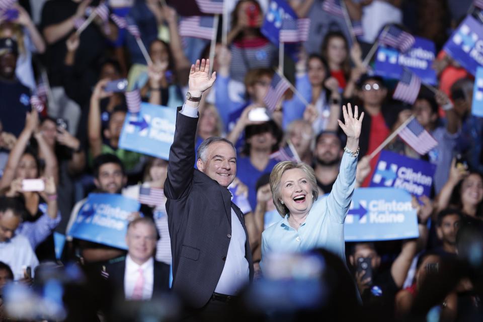 Democratic presidential candidate Hillary Clinton and Sen. Tim Kaine, D-Va., arrive at a campaign rally at Florida International University in Miami on July 23, 2016. (Photo/Mary Altaffer/AP)