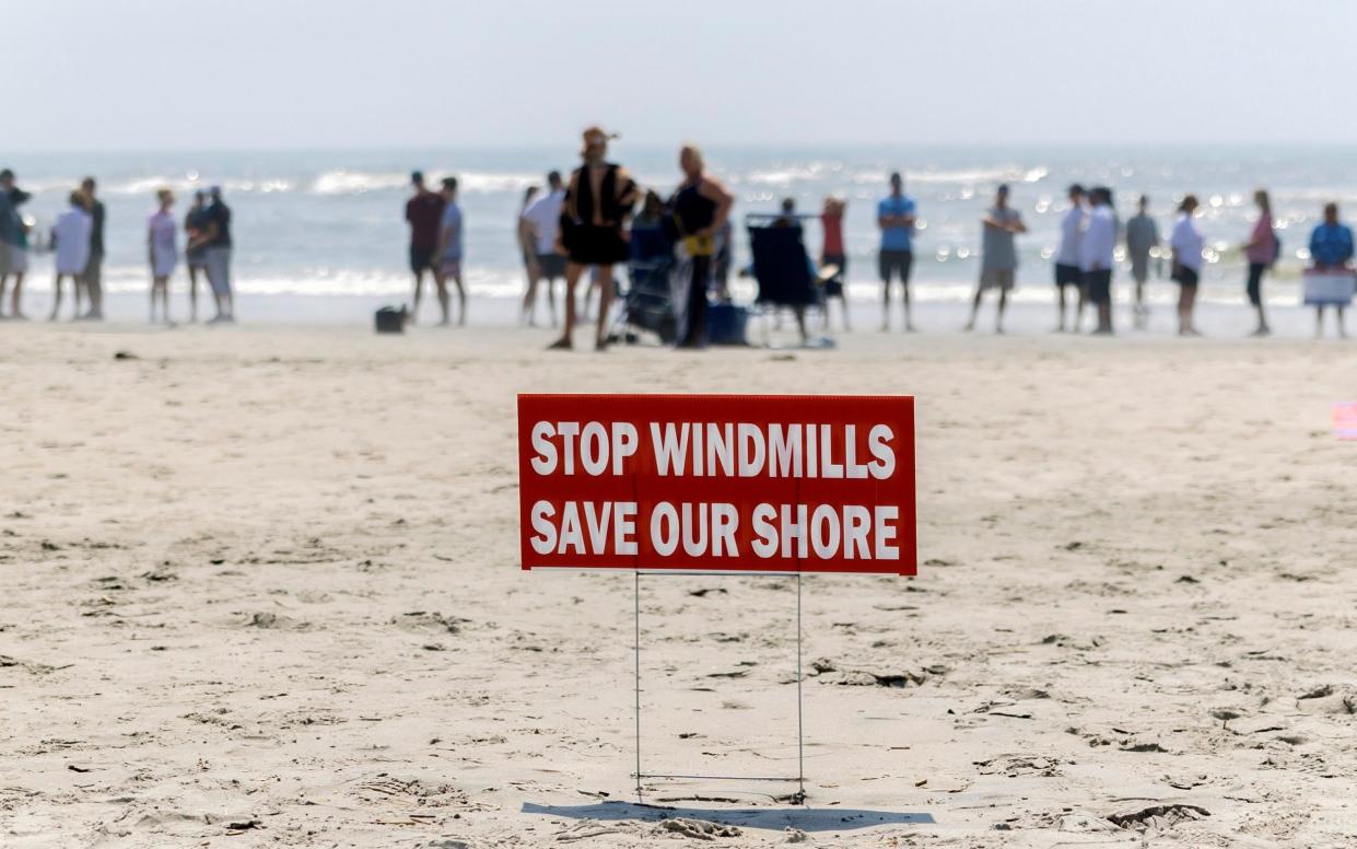Beachgoers protesting against the installation of wind turbines in New Jersey earlier this year