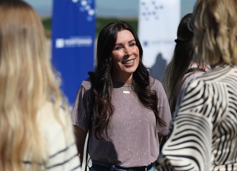 Jenni Thompson smiles as Huntsman Cancer Institute announces plans to develop a cancer center in Utah County in Vineyard on Wednesday, June 21, 2023. Thompson’s husband died of leukemia and she beat breast cancer. | Jeffrey D. Allred, Deseret News