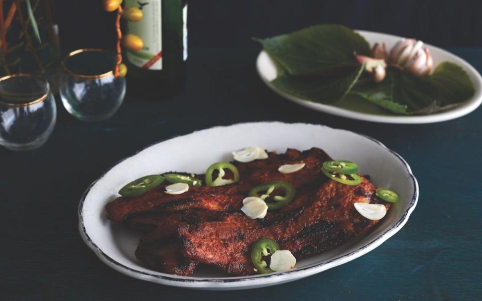 <p>Parade</p><p>This Gochujang pork belly is like bacon jerky and a delicious way to get acquainted with the Korean gochujang paste. Serve with lettuce leaves and steamed rice.</p><p><strong>Get the recipe: <a href="https://parade.com/634365/alison-ashton/gochujang-cured-pork-belly/" rel="nofollow noopener" target="_blank" data-ylk="slk:Gochujang Pork Belly;elm:context_link;itc:0;sec:content-canvas" class="link ">Gochujang Pork Belly</a></strong></p>