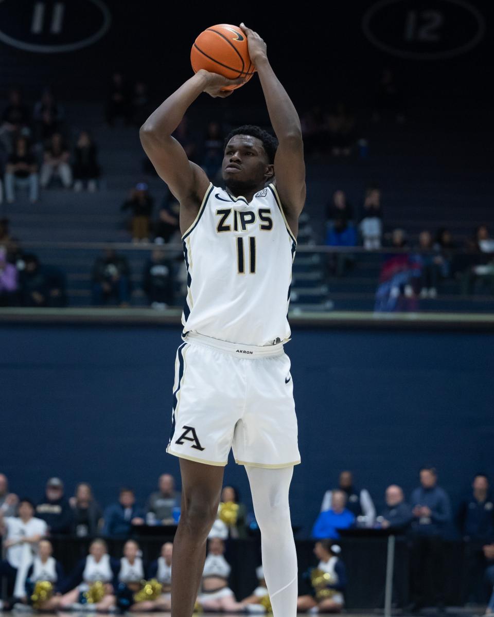 Akron's Sammy Hunter shoots a 3-pointer against Ball State on Feb. 28 in Akron.