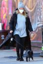 <p>Pregnant Hilary Duff sips an iced coffee while walking her dog on Wednesday in N.Y.C. </p>