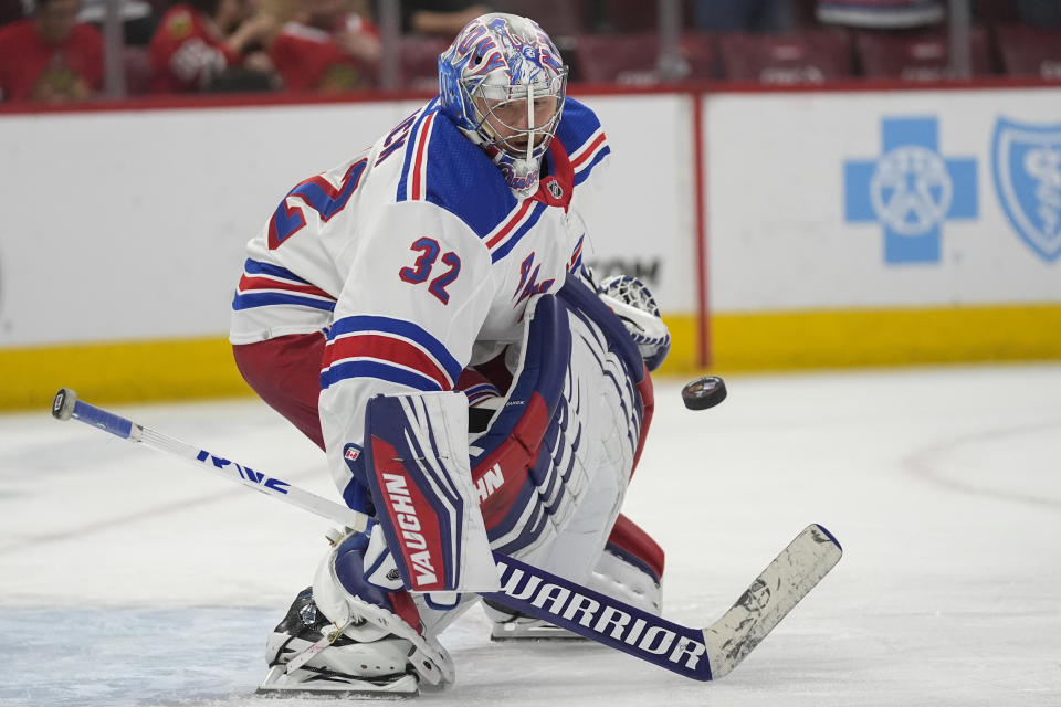 New York Rangers goaltender Jonathan Quick warms up for the team's NHL hockey game against the Chicago Blackhawks, Friday, Feb. 9, 2024, in Chicago. (AP Photo/Erin Hooley)