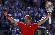 Switzerland's Roger Federer celebrates after winning his men's singles tennis semifinal match against Argentina's Juan Martin del Potro. (Reuters)