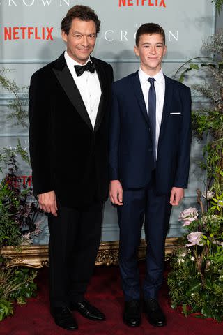 <p>Jeff Spicer/Getty</p> Dominic West and Senan West at The Crown season 5 premiere in London in November 2022.