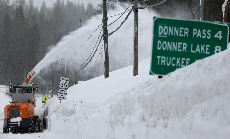 A snow blower operates following a massive snowstorm in the Sierra Nevada mountains on March 04, 2024 in Soda Springs, California (Getty Images)