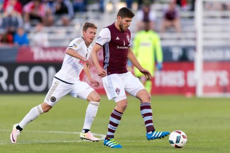 May 28, 2016; Commerce City, CO, USA; Colorado Rapids midfielder Dillon Powers (8) controls the ball in the first half against the Philadelphia Union at Dick's Sporting Goods Park. The match ended in a 1-1 draw. Mandatory Credit: Isaiah J. Downing-USA TODAY Sports