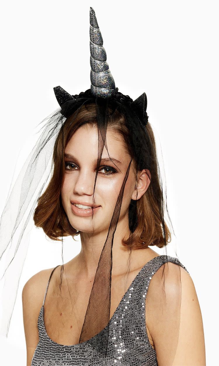 <p>Halloween Dark Unicorn Veil, £12, Topshop</p><p><a rel="nofollow noopener" href="https://www.topshop.com/en/tsuk/product/clothing-427/halloween-5978563/halloween-dark-unicorn-veil-8049444?dual_run=monty&" target="_blank" data-ylk="slk:BUY NOW;elm:context_link;itc:0;sec:content-canvas" class="link ">BUY NOW</a></p>