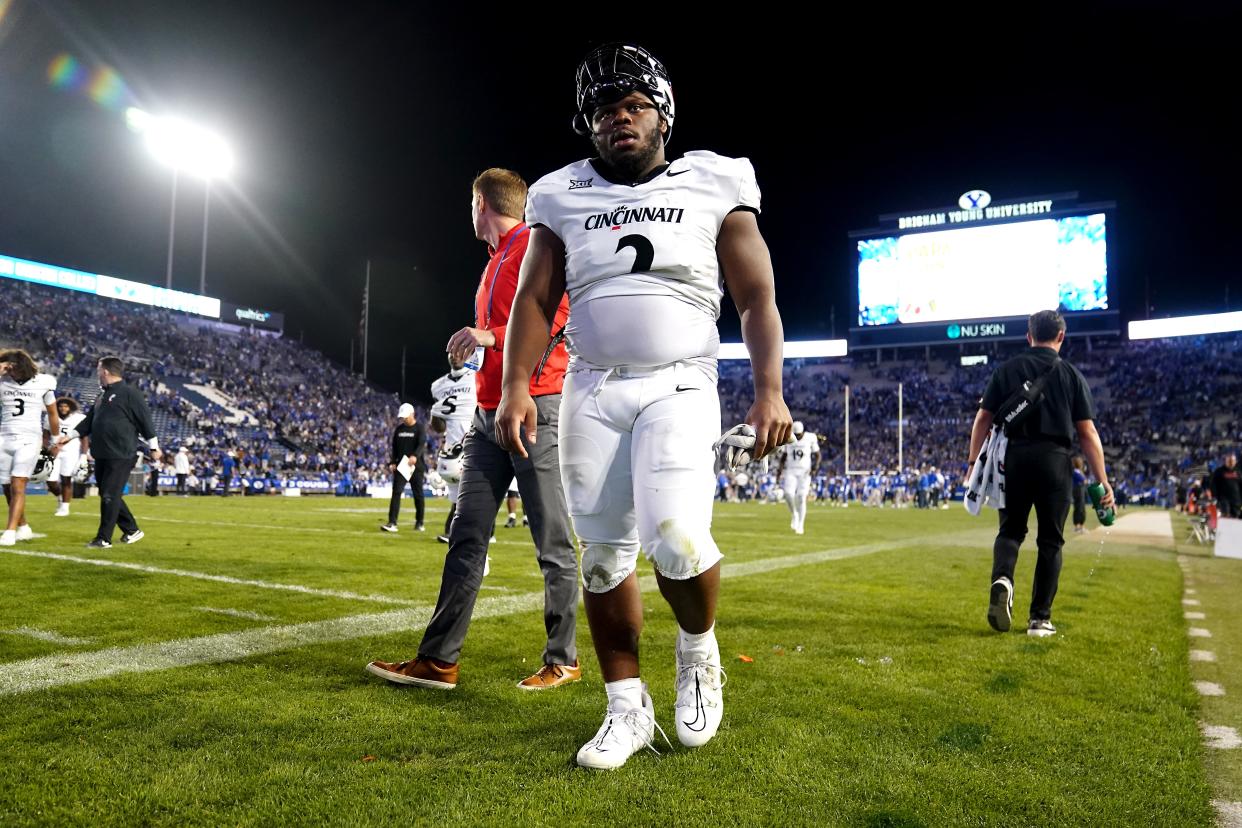 UC defensive lineman Dontay Corleone will battle West Virginia All-American center Zach Frazier Saturday as the Bearcats try to claw out a win in Morgantown.