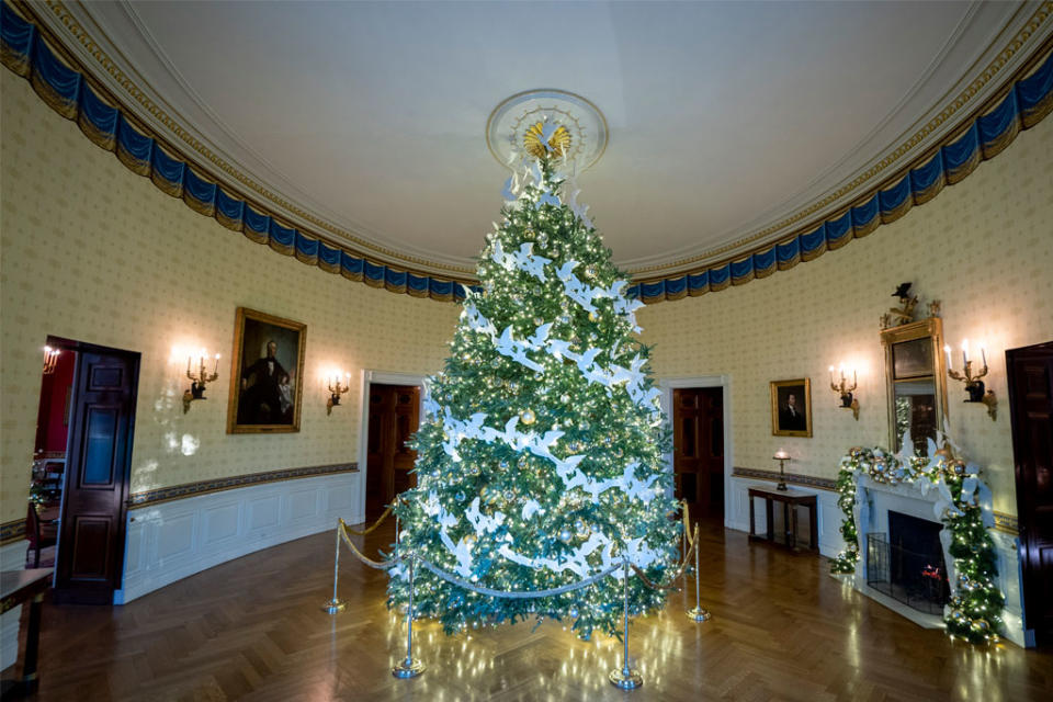 The Official White House Christmas tree in the Blue Room. - Credit: Sipa USA via AP