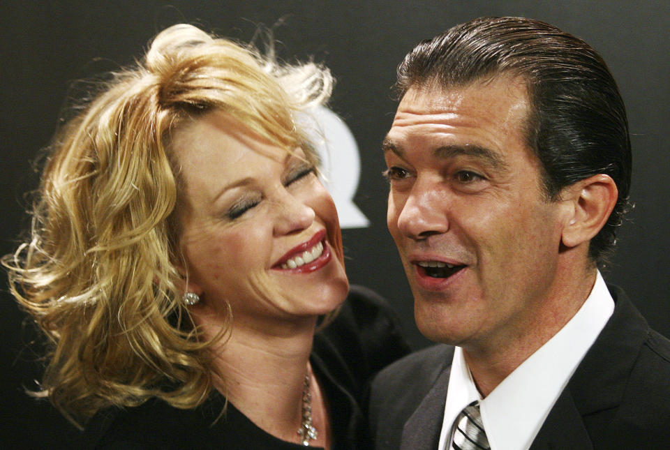 Spanish actor and director Antonio Banderas and his wife U.S. actress Melanie Griffith pose before the start of the sixth annual GQ Magazine Men of the Year Awards in Madrid November 27, 2006. Banderas was recognized with the "Filmmaker of the Year" award. REUTERS/Susana Vera (SPAIN)