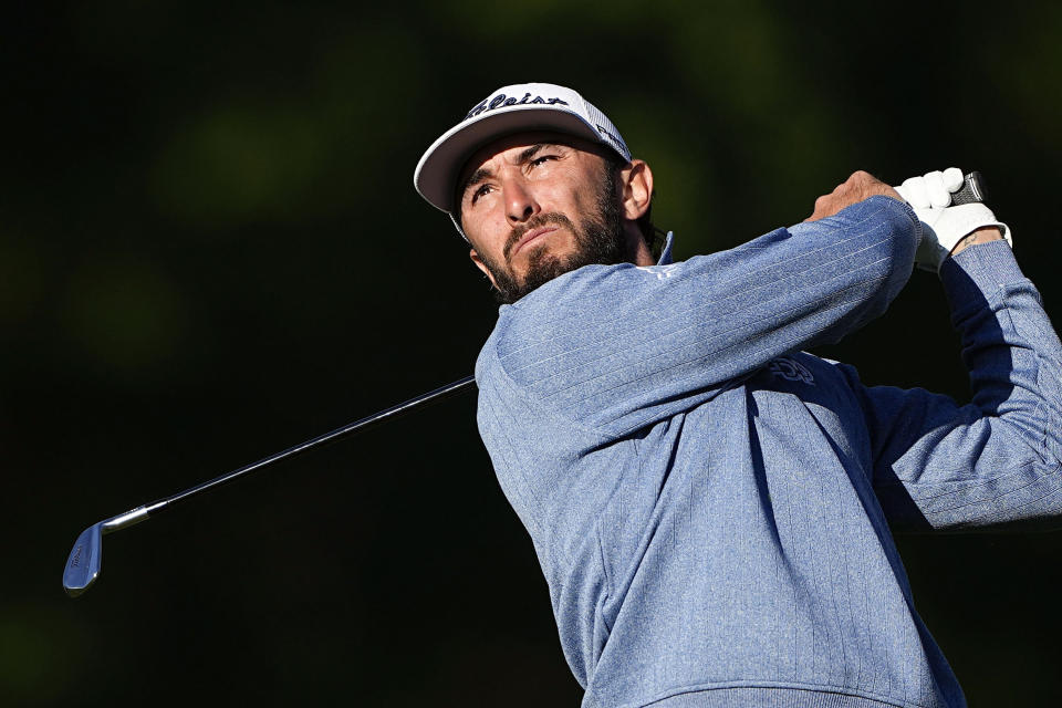 FILE - Max Homa watches his tee shot on the 13th hole during first round of the Wells Fargo Championship golf tournament at the Quail Hollow Club on Thursday, May 4, 2023, in Charlotte, N.C. (AP Photo/Chris Carlson, File)