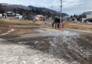 Melting snow is seen at a ski resort in Hakuba village