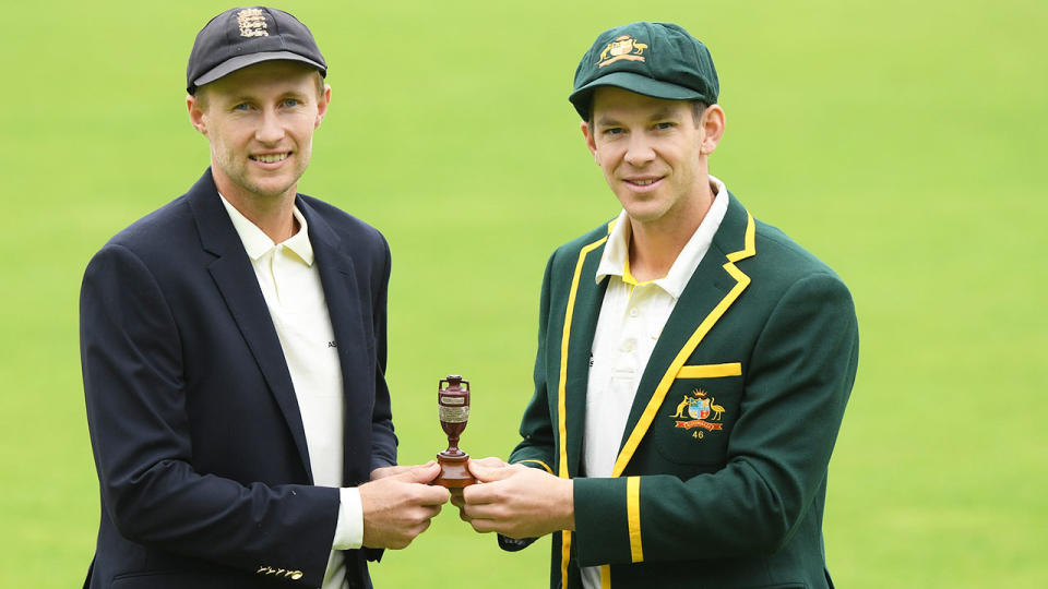 Pictured here, England captain Joe Root and Aussie counterpart Tim Paine pose with the Ashes urn.