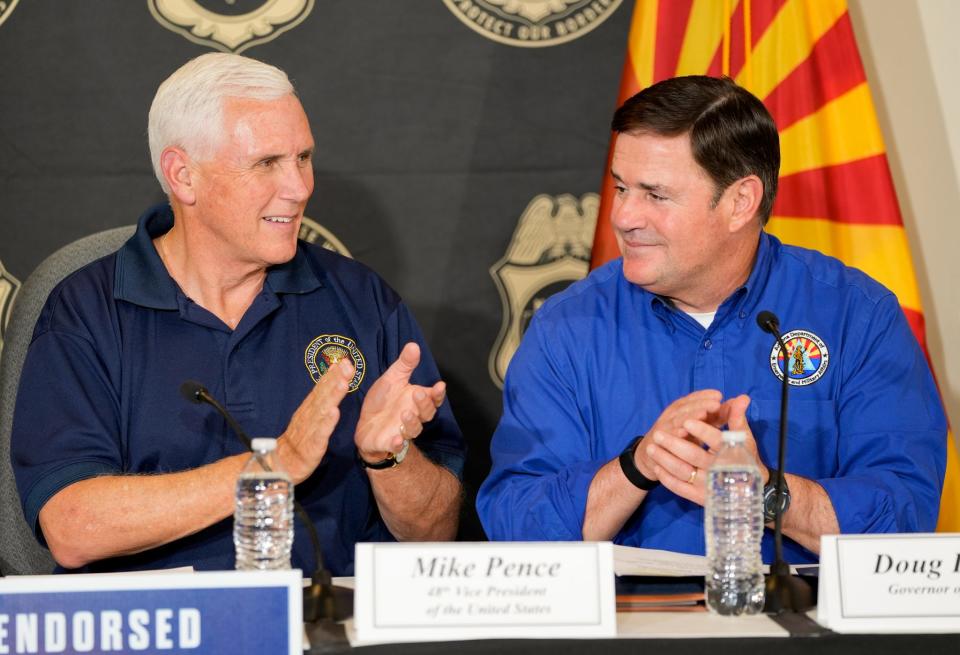 Former Vice President Mike Pence and Gov. Doug Ducey attend a border security briefing discussion at the National Border Patrol Council in Tucson on July 22, 2022.