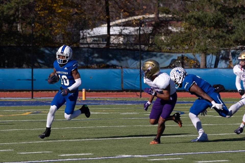 Middletown's Michael Culver runs with the ball in a Middletown vs Christian Brothers Academy of Albany game in Middletown, NY on November 18, 2023. ALLYSE PULLIAM/For the Times Herald-Record