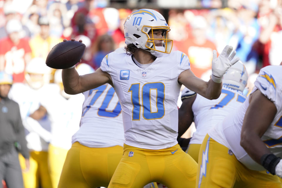 Los Angeles Chargers quarterback Justin Herbert passes during an NFL football game against the Kansas City Chiefs Sunday, Oct. 22, 2023 in Kansas City, Mo. (AP Photo/Ed Zurga)