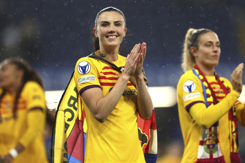 Barcelona's Ingrid Engen, center, applauds after the Women's Champions League, semi final second leg, soccer match between FC Chelsea and FC Barcelona in London, England, Saturday, April 27, 2024. (Kieran Cleeves/PA via AP)