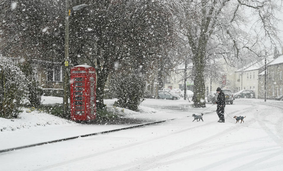 Heavy snow in Allendale, northern England, Wednesday April 3, 2019, after temperatures dipped below freezing overnight.  According to forecasters gales, sleet and snow on high ground are expected for parts of the UK as the chilly snap keeps hold. (Owen Humphreys/PA via AP)