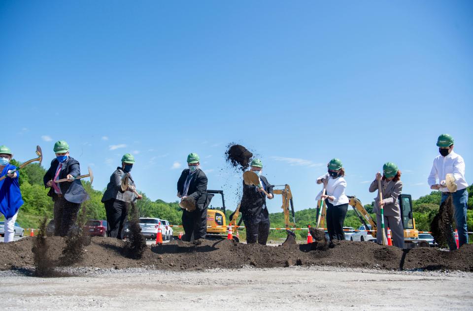 Distinguished guests break ground on the site of a new high school to replace the existing Hillwood High School in West Nashville on Wednesday, May 12, 2021, in Bellevue, Tenn. The new high school was made possible by a $100 million investment by Mayor John Cooper and the Metro Council in the 2021-22 fiscal year capital spending plan.