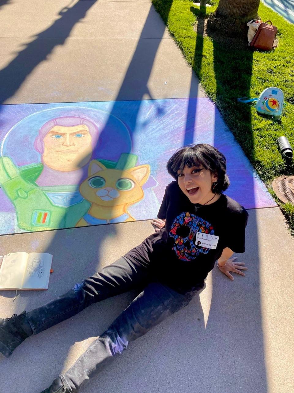 Jessie Plascencia with her chalk drawings