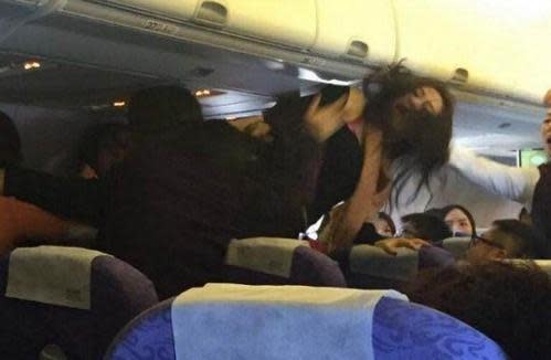 Woman kicked off plane for screaming about seat near baby 