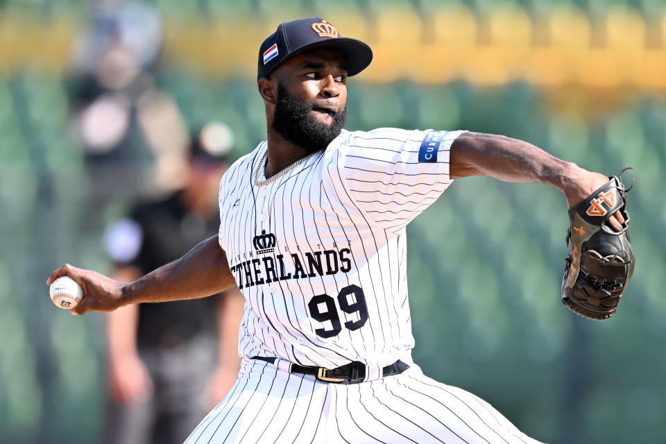 TAICHUNG, TAIWAN - MARCH 09: Wendell Floranus #99 of Team Netherlands pitches at the top of the 9th inning during the World Baseball Classic Pool A game between Panama and Netherlands at Taichung Intercontinental Baseball Stadium on March 09, 2023 in Taichung, Taiwan. (Photo by Gene Wang/Getty Images)