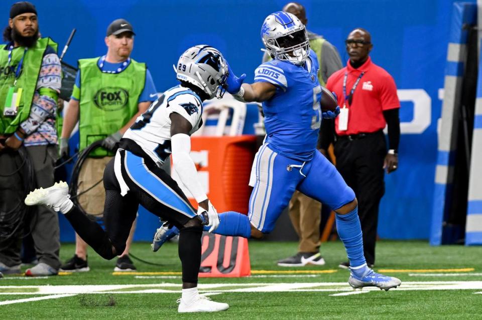 Oct 8, 2023; Detroit, Michigan, USA; Detroit Lions running back David Montgomery (5) runs for a touchdown against the Carolina Panthers in the first quarter at Ford Field. Mandatory Credit: Lon Horwedel-USA TODAY Sports