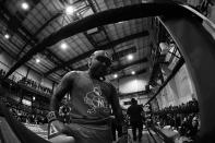 <p>Makesi Oliver stands in his corner before his fight against Mark Evans in the “Bronx Tough Turkey Tussle” in the Hunts Point section of the Bronx, New York, on Nov. 16, 2017. (Photo: Gordon Donovan/Yahoo News) </p>