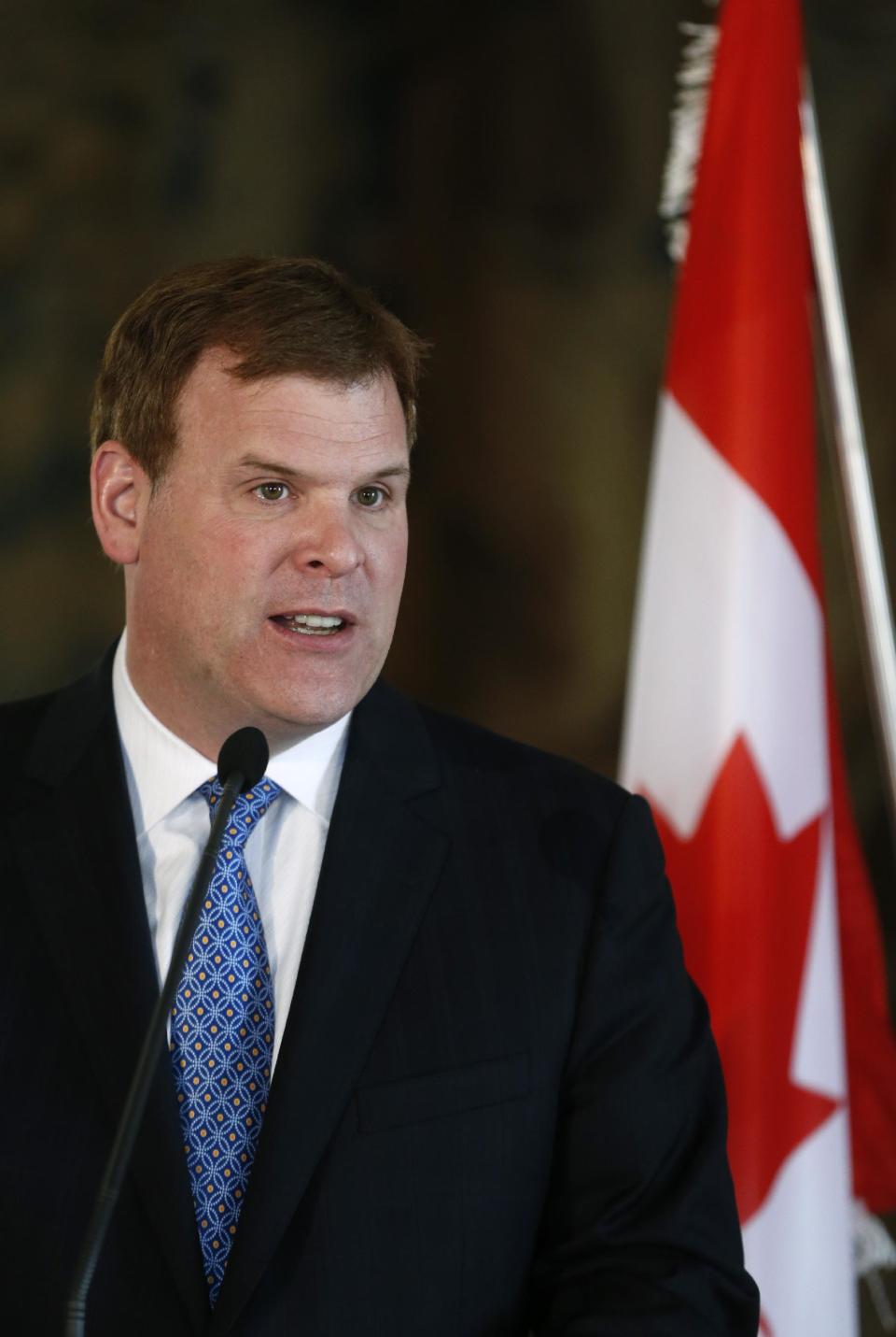 Canadian Foreign Affairs Minister John Baird answers questions to media during a press conference in Prague, Czech Republic, Tuesday, April 22, 2014. (AP Photo/Petr David Josek)