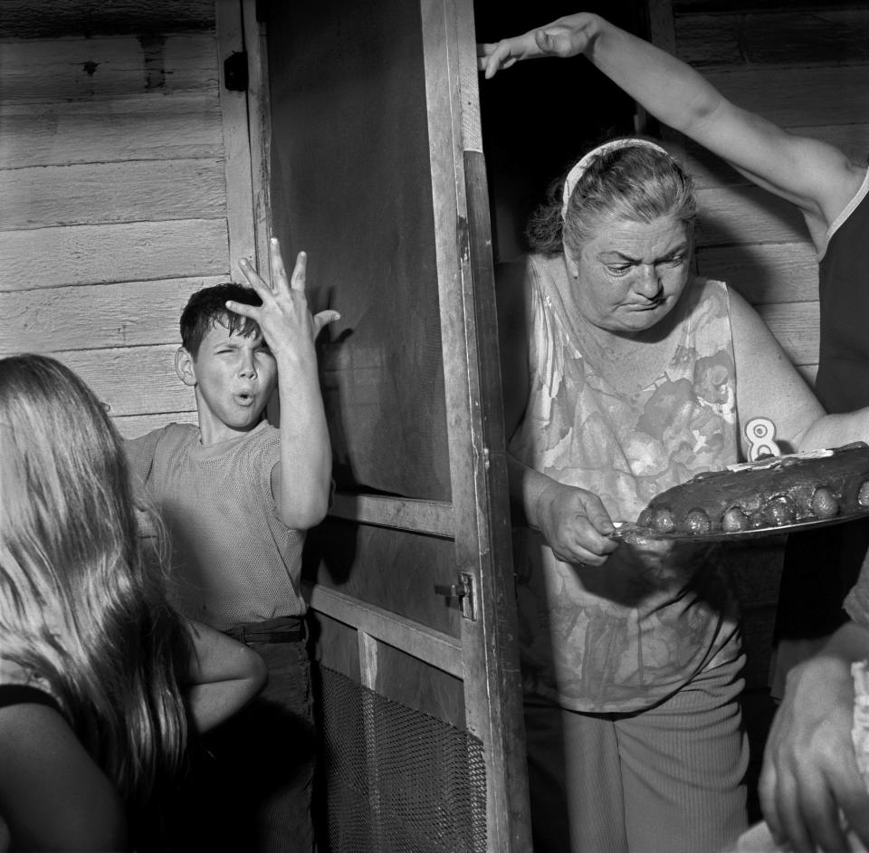 This photo provided by the Robert Mann Gallery by American photographer Larry Fink, is titled, “Pat Sabatine's 8th Birthday Party, PA," 1977. Fink, an acclaimed and adventurous photographer whose subjects ranged from family portraits and political satire to working class lives and the elite of show business and Manhattan society, died at age 82. Robert Mann, owner of the Robert Mann Gallery, told The Associated Press that Fink died Saturday, Nov. 25, 2023, at his home in Martins Creek, Pa. (Larry Fink/Courtesy Robert Mann Gallery via AP)