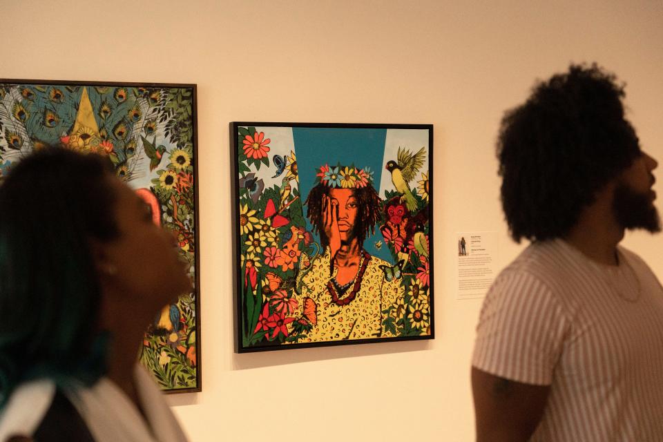 Guest-curators Mali Jeffers, left, and Alan Bacon discuss their 'We. The Culture' gallery Tuesday, Sept. 20, 2022, at the Indianapolis Museum of Art at Newfields.