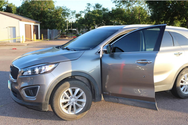 According to the DCI: This August 9, 2022, photograph of the front driver’s side door of a Minnehaha County Sheriff’s Office Investigator’s unmarked vehicle shows evidence of damage from gun shots.