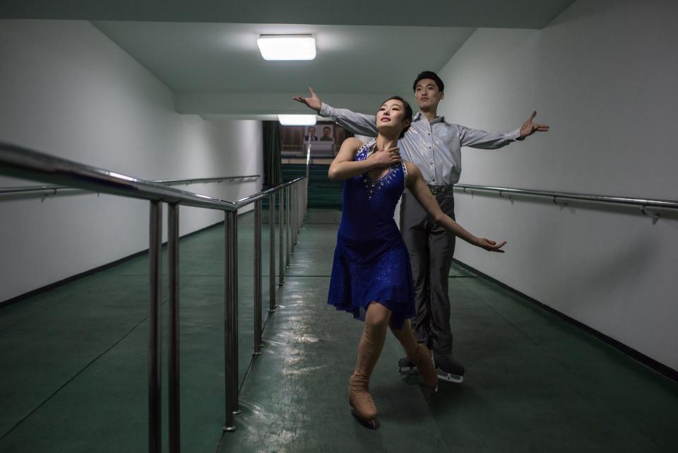 Figure skaters Nam Yong-Myong (left) and Choe Min pose for a portrait in Pyongyang. The skaters were performing at the Paektusan Prize international figure skating festival.
