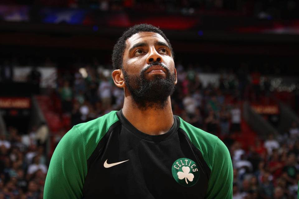 MIAMI, FL - APRIL 3: Kyrie Irving #11 of the Boston Celtics stands for the National Anthem before the game against the Miami Heat on April 3, 2019 at American Airlines Arena in Miami, Florida. NOTE TO USER: User expressly acknowledges and agrees that, by downloading and/or using this photograph, user is consenting to the terms and conditions of the Getty Images License Agreement. Mandatory Copyright Notice: Copyright 2019 NBAE (Photo by Oscar Baldizon/NBAE via Getty Images)