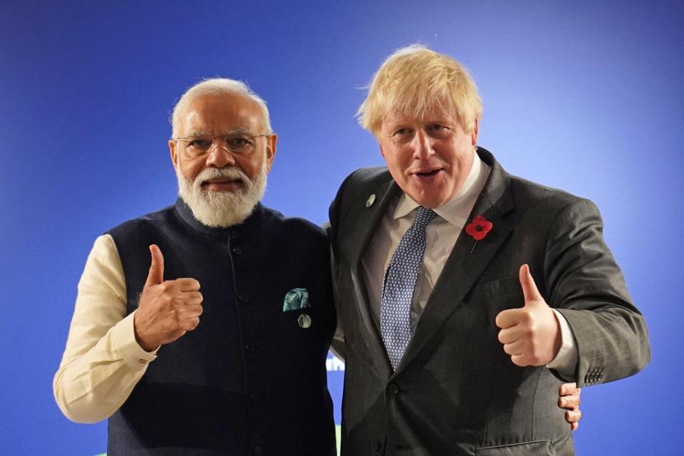 Mr Johnson greets India’s prime minister Narendra Modi ahead of their bilateral meeting (Stefan Rousseau/PA) (PA Wire)