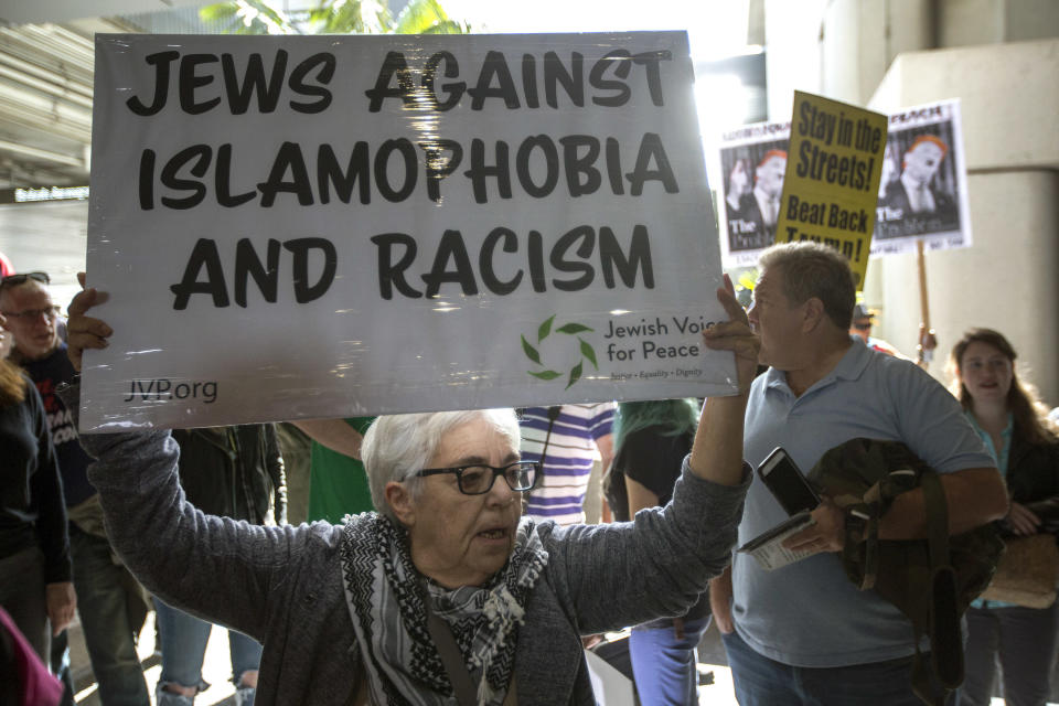 Demonstrators support a ruling by a federal judge in Seattle that grants a nationwide temporary restraining order against the presidential order to ban travel to the United States from seven Muslim-majority countries, at Tom Bradley International Terminal at Los Angeles International Airport on February 4, 2017 in Los Angeles, California.&nbsp;