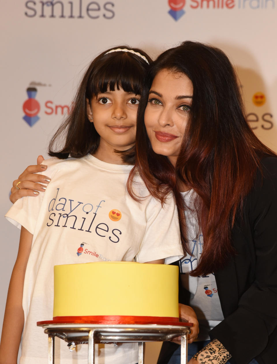 Indian Bollywood actress Aishwarya Rai Bachchan (R) poses with her daughter Aaradhya Bachchan during a birthday event with NGO Smile Train India in honour of her late father, Krishnaraj Rai, in Mumbai on November 20, 2018. - The Smile Train non-profit provides corrective surgery for children born with cleft lips and palates. (Photo by - / AFP)        (Photo credit should read -/AFP via Getty Images)