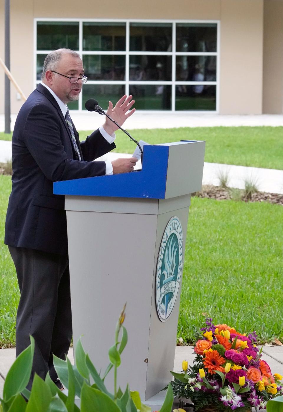 Daytona State College President Thomas LoBasso speaks during ribbon-cutting and dedication of the new student residence hall at Daytona State College, Thursday, May 5, 2022.