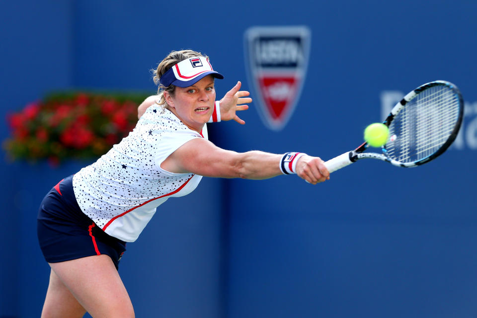 Kim Clijsters of Belgium returns a shot against Laura Robson of Great Britain during their women's singles second round match Day Three of the 2012 US Open at USTA Billie Jean King National Tennis Center on August 29, 2012 in the Flushing neigborhood of the Queens borough of New York City. (Photo by Cameron Spencer/Getty Images)