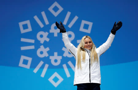 FILE PHOTO: Medals Ceremony - Alpine Skiing - Pyeongchang 2018 Winter Olympics - Women's Downhill - Medals Plaza - Pyeongchang, South Korea - February 21, 2018 - Bronze medalist Lindsey Vonn of the U.S. on the podium. REUTERS/Kim Hong-Ji/File Photo