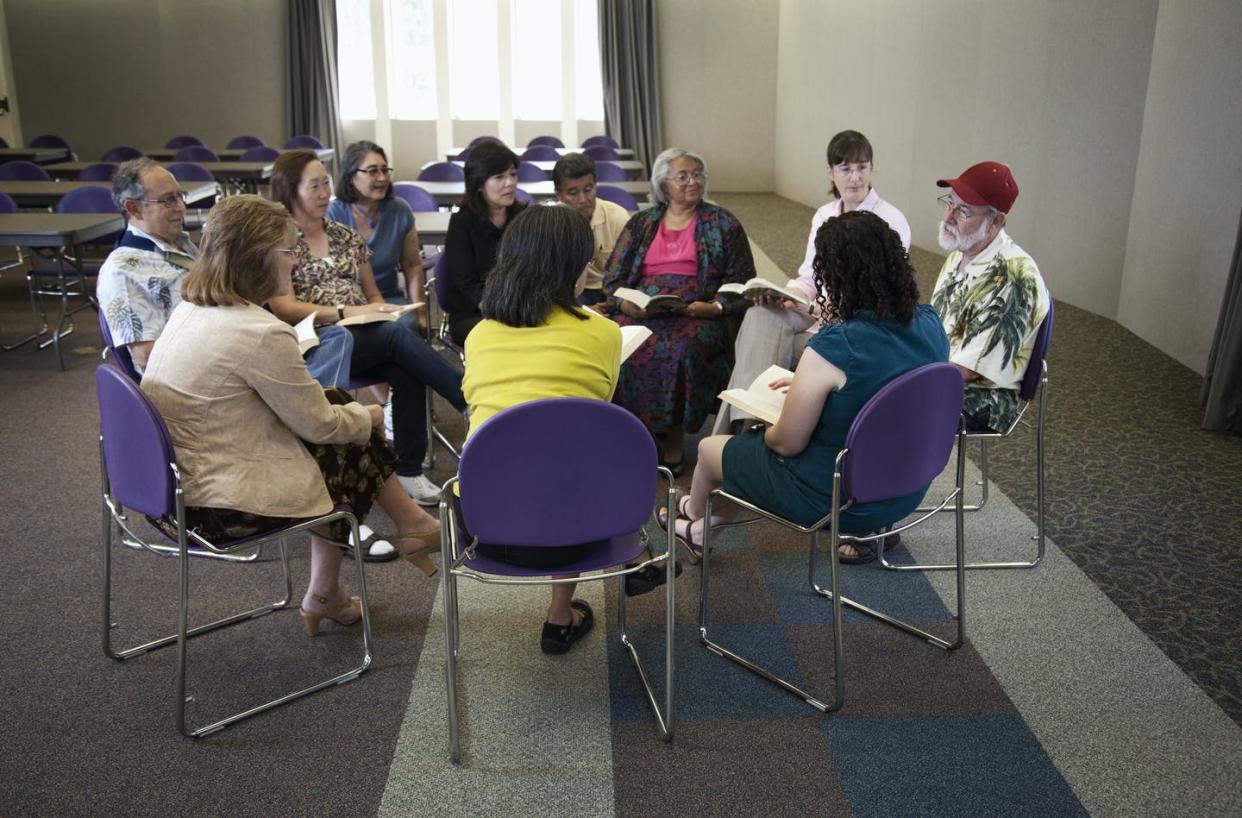 <span class="caption">Members of book clubs can impose rules through penalties.</span> <span class="attribution"><a class="link " href="https://www.gettyimages.com/detail/photo/friends-enjoying-book-club-royalty-free-image/112228828?adppopup=true" rel="nofollow noopener" target="_blank" data-ylk="slk:Hill Street Studios/Stone via Getty Images;elm:context_link;itc:0;sec:content-canvas">Hill Street Studios/Stone via Getty Images</a></span>